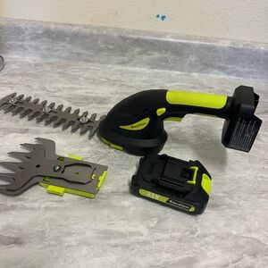 Green and Black Electric Hedge Trimmer